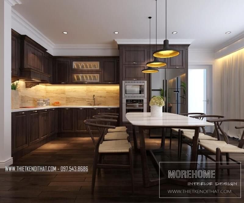 Tủ bếp chung cư ấn tượng với tone màu trầm mang lại từ gỗ óc chó cao cấp, ngoài ra còn khéo léo lồng ghép tcác thiết bị gia dụng nhà bếp hiện đại giúp cho những người nội trợ dễ dàng chế biết mang lại cho người yêu thương của mình những món ăn ngon miệng Tủ bếp chung cư